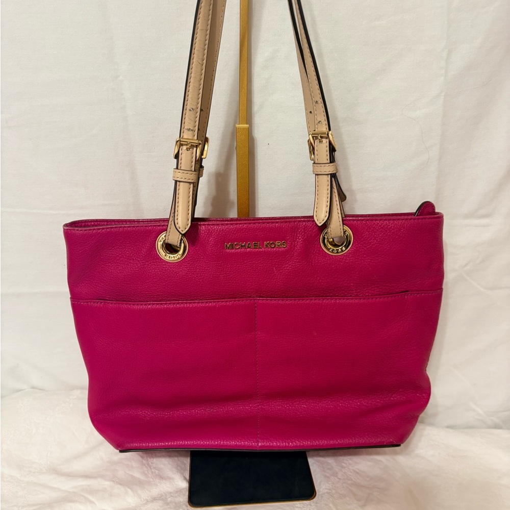 Michael Kors Bedford Top Zip Pocket Tote in fuchsia grained leather.
